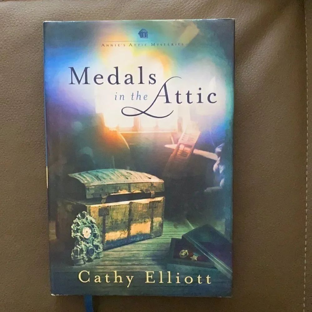 “Medals in the Attic” Annie’s Attic Mysteries